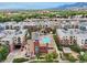 Discover community living with a pool, hot tub, and outdoor living spaces from this beautiful aerial view at 3701 Arapahoe Ave # 106, Boulder, CO 80303