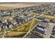 A Primary planned community features modern homes, green spaces, and walking trails at 21440 E 61St Dr, Aurora, CO 80019