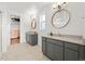 Bathroom featuring double vanity, walk-in shower and modern finishes at 21440 E 61St Dr, Aurora, CO 80019