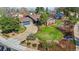 Beautiful aerial view of house featuring a well-manicured lawn and large driveway at 10801 W 29Th Ave, Lakewood, CO 80215