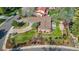Aerial view of landscaped yard with mature trees, patio, and well-kept garden at 10801 W 29Th Ave, Lakewood, CO 80215