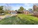 Charming home with beautiful landscaping, mature trees and a long drive at 10801 W 29Th Ave, Lakewood, CO 80215