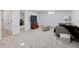 Spacious finished basement features a comfortable seating area, built-ins, and a stylish modern design at 10801 W 29Th Ave, Lakewood, CO 80215