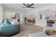 Bright living room with a view of the dining area, modern decor, and hardwood floors at 10801 W 29Th Ave, Lakewood, CO 80215