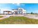 Spacious backyard featuring a pergola, patio, and plenty of room for outdoor entertaining at 6051 E 160Th Pl, Brighton, CO 80602