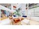 Sun-filled living room features high ceilings, large windows, and an open layout at 6051 E 160Th Pl, Brighton, CO 80602
