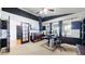 Home office features a neutral color scheme, ceiling fan, and plenty of natural light at 6051 E 160Th Pl, Brighton, CO 80602