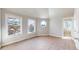 Bright bedroom featuring a vaulted ceiling, carpeted floor, and uniquely shaped windows at 2503 N Ogden St, Denver, CO 80205