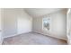 Cozy bedroom featuring carpeted floor, closet with double doors, and a bright window at 2503 N Ogden St, Denver, CO 80205