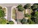 The home's roof and landscaping on a verdant corner lot is captured in this aerial view at 4810 W 102Nd Pl, Westminster, CO 80031