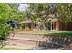 Backyard of a brick home with a patio area at 4810 W 102Nd Pl, Westminster, CO 80031