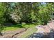 Landscaped backyard featuring a walking path at 4810 W 102Nd Pl, Westminster, CO 80031