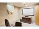 Media room with screen, projector, seating, and track lighting at 4810 W 102Nd Pl, Westminster, CO 80031