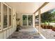 Covered patio with view of a large landscaped yard and trees at 4810 W 102Nd Pl, Westminster, CO 80031