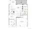 Detailed first floor floorplan featuring a gourmet kitchen, great room, dining, mud room, and three-car garage at 5485 Riverbend Ave, Firestone, CO 80504
