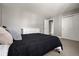 This is a bedroom with closet and carpet at 2271 Coronado N Pkwy # D, Denver, CO 80229