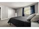 This is a bedroom with carpet and closet at 2271 Coronado N Pkwy # D, Denver, CO 80229