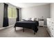 Serene bedroom with soft carpet, modern decor, and ample natural light at 2271 Coronado N Pkwy # D, Denver, CO 80229