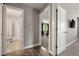 Hallway showing entrances to the bathroom and bedroom at 2271 Coronado N Pkwy # D, Denver, CO 80229