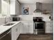 Contemporary kitchen showcasing modern appliances, sleek countertops, and efficient layout at 2271 Coronado N Pkwy # D, Denver, CO 80229