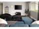 Comfortable living room with ample seating, a large window, and modern decor at 2271 Coronado N Pkwy # D, Denver, CO 80229