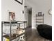 Stylish living room featuring a dry bar and access to the adjacent living area at 2271 Coronado N Pkwy # D, Denver, CO 80229