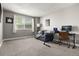 This is a bedroom with desk, sofa, carpet, and closet at 2271 Coronado N Pkwy # D, Denver, CO 80229