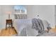 Bright bedroom features stylish decor, comfortable bed, and ample natural light at 2725 S Monroe St, Denver, CO 80210