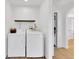 Practical laundry room featuring modern washer and dryer at 2725 S Monroe St, Denver, CO 80210