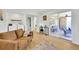 Open living room featuring a comfortable sofa and easy access to a covered patio at 2725 S Monroe St, Denver, CO 80210
