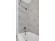 Beautifully tiled shower with modern fixtures and a spa-like feel at 2725 S Monroe St, Denver, CO 80210