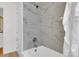 Beautifully tiled shower with modern fixtures and a spa-like feel at 2725 S Monroe St, Denver, CO 80210