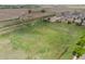 Establishing shot featuring expansive view of the home and neighboring land, showing community layout at 1523 Honeysuckle Ct, Brighton, CO 80601