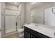 Well-lit bathroom featuring a glass-enclosed shower, sleek vanity, and modern fixtures at 1523 Honeysuckle Ct, Brighton, CO 80601