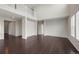 Spacious living area with hardwood floors and an open layout to a second floor at 1523 Honeysuckle Ct, Brighton, CO 80601
