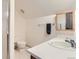 Simple bathroom with a toilet and a vanity at 4861 Curie Ct, Boulder, CO 80301
