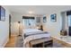 Cozy bedroom with hardwood floors and ample natural light at 4861 Curie Ct, Boulder, CO 80301