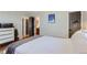 Bright bedroom with hardwood floors and access to a bathroom at 4861 Curie Ct, Boulder, CO 80301