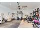 Garage gym with weight rack, bikes, and mats at 4861 Curie Ct, Boulder, CO 80301