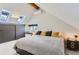 Spacious main bedroom with vaulted ceilings and a window seat at 4861 Curie Ct, Boulder, CO 80301