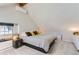 Bright main bedroom with window seat and ensuite bathroom access at 4861 Curie Ct, Boulder, CO 80301
