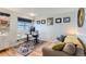 Home office features a built-in desk and comfortable seating at 4861 Curie Ct, Boulder, CO 80301