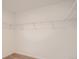 Walk-in closet with wire shelving on the upper walls of the storage space at 13832 Honey Hush Trl, Parker, CO 80134