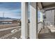 View from covered porch with mountain range in the distance at 13832 Honey Hush Trl, Parker, CO 80134