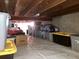 Unfinished crawl space used for storage and sealed with a moisture barrier at 6719 W 70Th Ave, Arvada, CO 80003