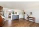 Spacious living room featuring hardwood floors and ample space for furniture and decor at 6719 W 70Th Ave, Arvada, CO 80003