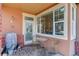 Charming covered patio features seating and an outdoor grill, perfect for relaxing at 15222 E Batavia Pl, Aurora, CO 80011
