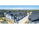 Panoramic aerial view of modern townhomes in a community with scenic mountain backdrop at 157 Ambrose St, Erie, CO 80516