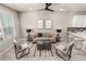 Bright living room with modern furnishings and hardwood floors at 157 Ambrose St, Erie, CO 80516