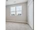 Bedroom with large window and spacious closet at 3500 S Corona St # 409, Englewood, CO 80113